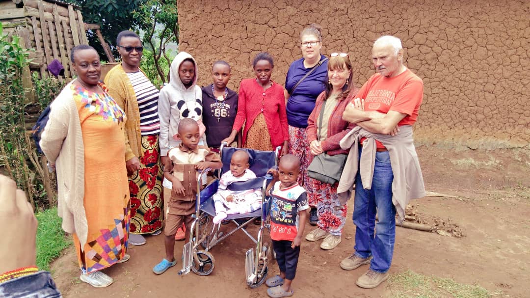Child receiving wheelchair support